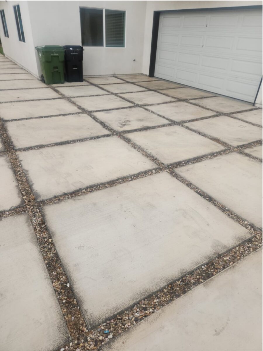 Dirty concrete driveway pavers before Tykoon concrete restoration